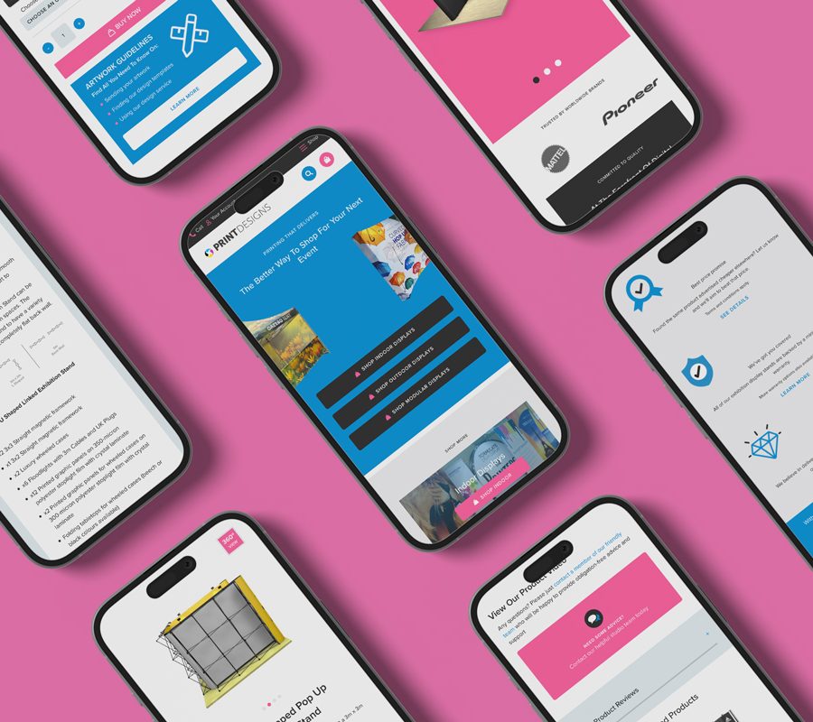 Multiple mobile phones on a pink background, displaying various webpages from the Print Designs website.