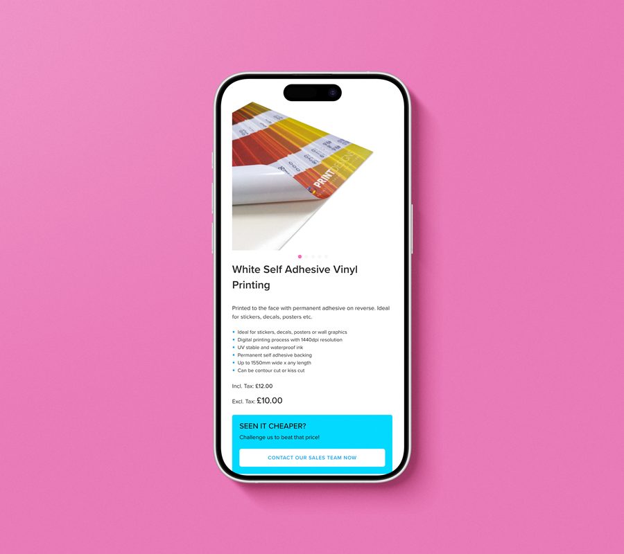 Mobile phone on a pink background, displaying a webpage from the Print Designs website.