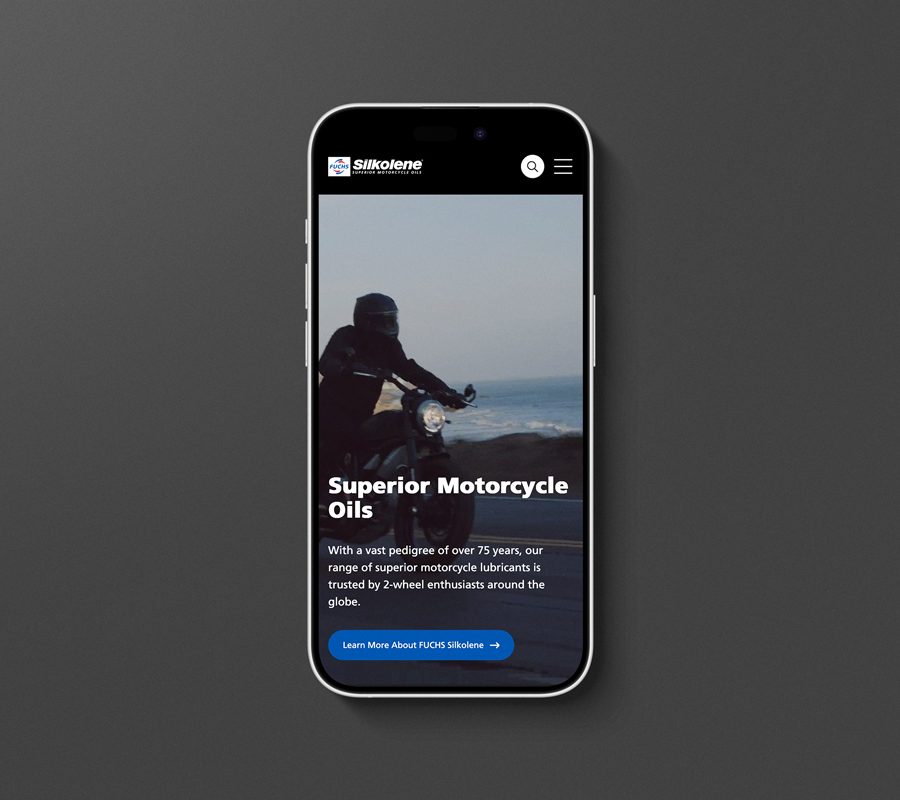 Mobile phone on a grey background displaying Silkolene's new website